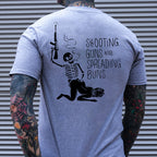 SHOOTING GUNS AND SPREADING BUNS Skull with Sexy Lady Print T-shirt