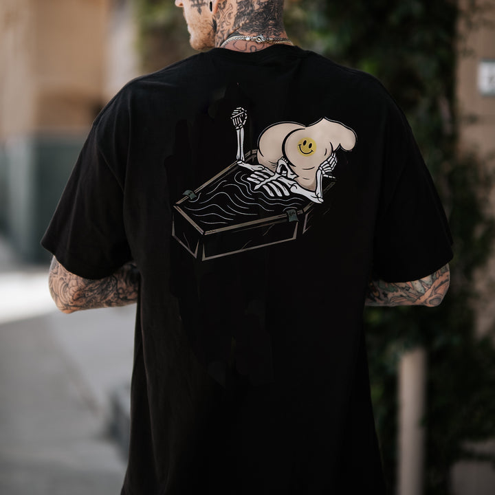 Skull Eat the Naked Ass in the Coffin Graphic Black Print T-shirt