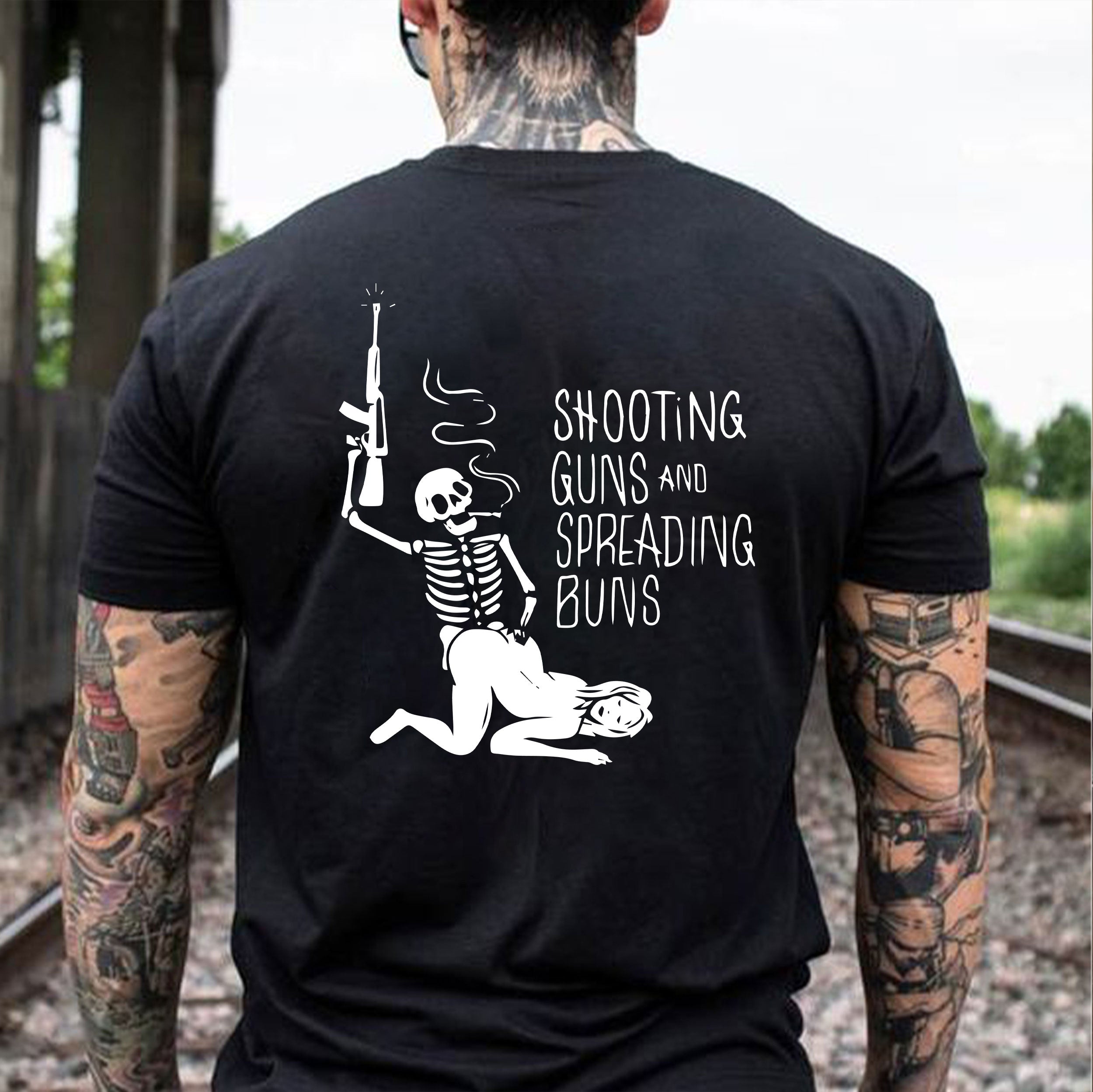 SHOOTING GUNS AND SPREADING BUNS Skull with Sexy Lady Print T-shirt